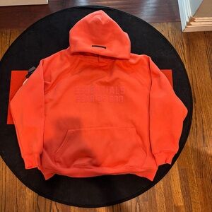 Essentials hoodie ‘coral’